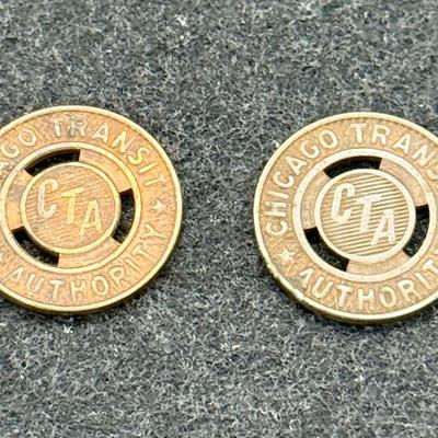 Sale Photo Thumbnail #439: Pair of CTA transit tokens. Slightly smaller than a US dime. Rare, in very good condition. The CTA began operation in 1947, consolidating original operation of the Chicago Surface Lines from 1914. These tokens are likely from the mid 1940's or 1950's.