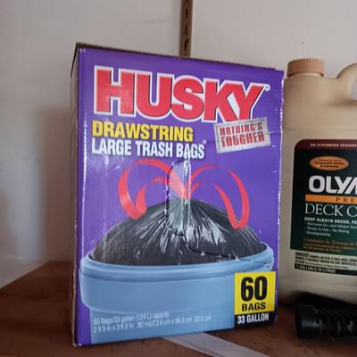 FULL CONTAINER OF DECK CLEANER, PARTIAL BOXES OF TRASH BAGS AND A SPRAYER