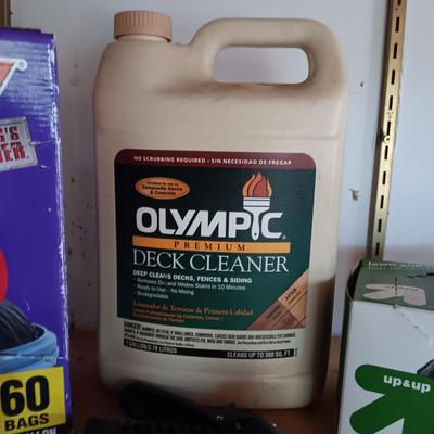 FULL CONTAINER OF DECK CLEANER, PARTIAL BOXES OF TRASH BAGS AND A SPRAYER