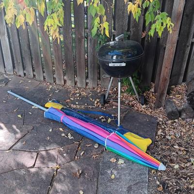 WEBER BBQ AND A LIKE NEW PATIO UMBRELLA