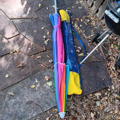 WEBER BBQ AND A LIKE NEW PATIO UMBRELLA