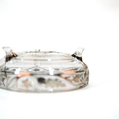 Sale Photo Thumbnail #311: This vintage bowl features a stunning flute cut design with acanthus silver overlay. On the inside of the bowl there is a small scratch as presented in picture. One of the legs has a small chip as listed in the pictures. 5 inches long as listed in picture