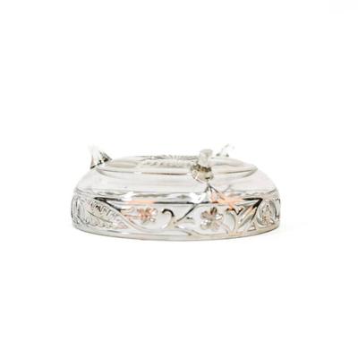 Sale Photo Thumbnail #306: This vintage bowl features a stunning flute cut design with acanthus silver overlay. On the inside of the bowl there is a small scratch as presented in picture. One of the legs has a small chip as listed in the pictures. 5 inches long as listed in picture