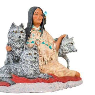 Sale Photo Thumbnail #102: This sculpture is crafted from polyresin and and is hand-painted.  The piece is also referred to as a  "Wild Majesty Indian Wolf Sculpture." 8 inches long as listed in picture.