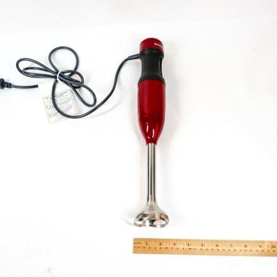 Sale Photo Thumbnail #414: This is a handheld immersion blender used for blending, pureeing, and crushing ingredients. 16 inches long as listed in picture.