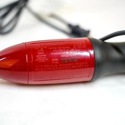 Sale Photo Thumbnail #418: This is a handheld immersion blender used for blending, pureeing, and crushing ingredients. 16 inches long as listed in picture.