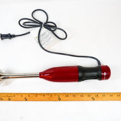 Sale Photo Thumbnail #413: This is a handheld immersion blender used for blending, pureeing, and crushing ingredients. 16 inches long as listed in picture.