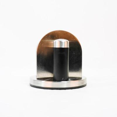 Sale Photo Thumbnail #470: This is a Kamenstein napkin holder with a salt and pepper caddy. It is a kitchen accessory designed to hold napkins and includes two shakers for salt and pepper. 6 inches long as listed in picture.