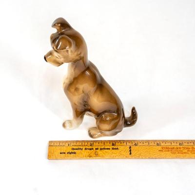 Sale Photo Thumbnail #359: Lady and the Tramp figurines from the 1955 animated Disney film. These figurines are made in Japan during 1950-1960s. These figurines were part of a larger collection of a Disney merchandise from that era. Both are 3 inches long as listed in picture.
