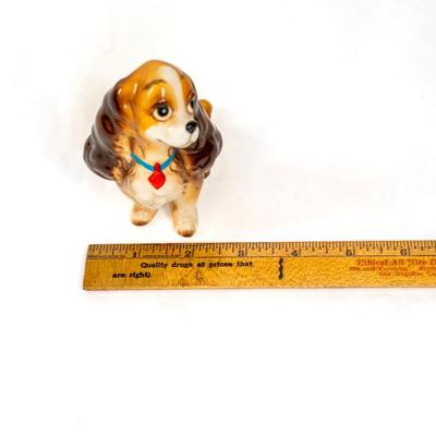 Sale Photo Thumbnail #358: Lady and the Tramp figurines from the 1955 animated Disney film. These figurines are made in Japan during 1950-1960s. These figurines were part of a larger collection of a Disney merchandise from that era. Both are 3 inches long as listed in picture.