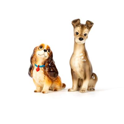 Sale Photo Thumbnail #353: Lady and the Tramp figurines from the 1955 animated Disney film. These figurines are made in Japan during 1950-1960s. These figurines were part of a larger collection of a Disney merchandise from that era. Both are 3 inches long as listed in picture.
