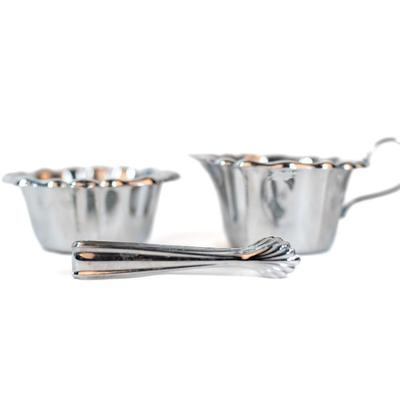 Sale Photo Thumbnail #342: This is a cream and sugar set with tongs.. Its silver plated made in Germany.