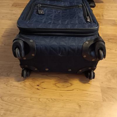 NICOLE MILLER CARRY ON AND SAMSONITE SUITCASE BOTH ON 4 WHEELS