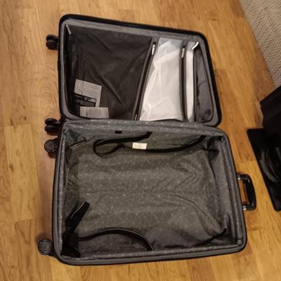 NICOLE MILLER CARRY ON AND SAMSONITE SUITCASE BOTH ON 4 WHEELS