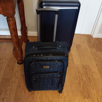 NICOLE MILLER CARRY ON AND SAMSONITE SUITCASE BOTH ON 4 WHEELS