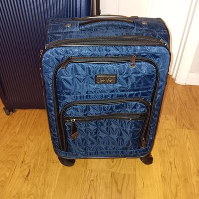 NICOLE MILLER CARRY ON AND SAMSONITE SUITCASE BOTH ON 4 WHEELS