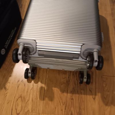 KENNETH COLE CARRY ON SUITCASE WITH COMBINATION & 4 WHEELS PLUS A DUFFLE BAG