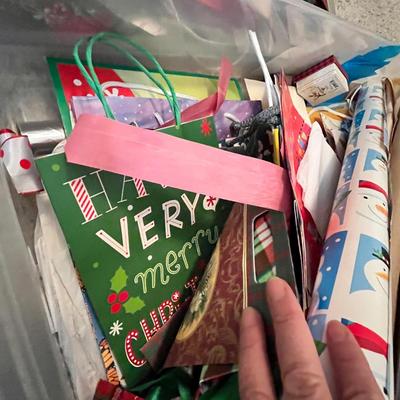 Lot 295 Long box of Christmas gift wrap & bags