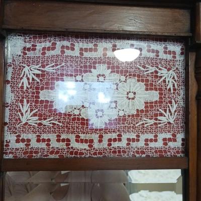 ANTIQUE WALL MIRROR WITH HAND CRAFTED DOLIE