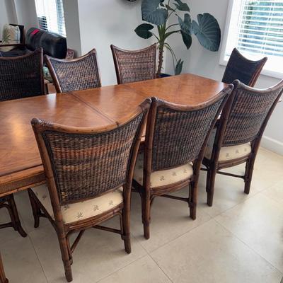 Sale Photo Thumbnail #5: Tommy bahama dinning room table in EXCELLENT condition, always had a cloth on it and seat covers. Comes with seat covers as well to protect the them. No scratches. Has a leaf in it so it can get smaller. 44 inches wide x 92inches long WITH leaf 62 inches 