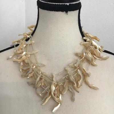 Sale Photo Thumbnail #159: Beautiful vintage, multi strand mother of pearl necklace. Please see attached photos.