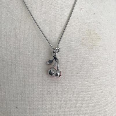 Sale Photo Thumbnail #12: Very nice dainty silver tone, cherry pendant, rhinestone necklace. Please see attached photos.