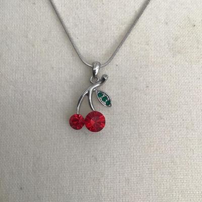 Sale Photo Thumbnail #15: Very nice dainty silver tone, cherry pendant, rhinestone necklace. Please see attached photos.