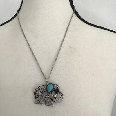 Sale Photo Thumbnail #43: Silvertone chain in Silvertone elephant with polished faux turquoise and rhinestone please see attached photos