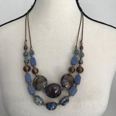 Sale Photo Thumbnail #120: Beautiful vintage, ceramic and polished earth stone necklace. Please see attached photos.