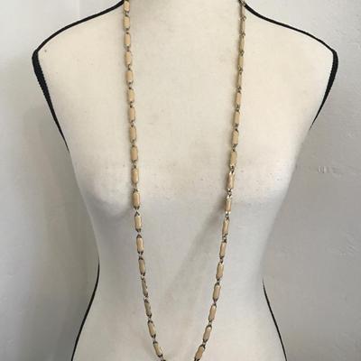 Sale Photo Thumbnail #221: Beautiful vintage, JC crew ivory enamel colored gold tone necklace. Please see attached photos.