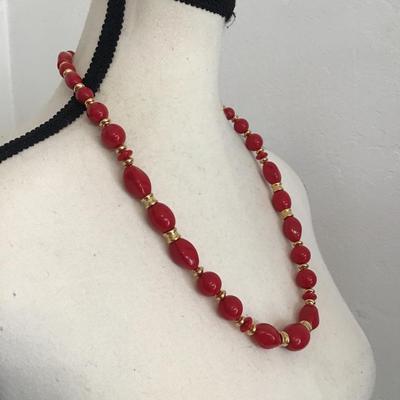 Sale Photo Thumbnail #244: Beautiful Liz, Claiborne, vintage red beaded necklace with gold tone accent. Please see attached photos.