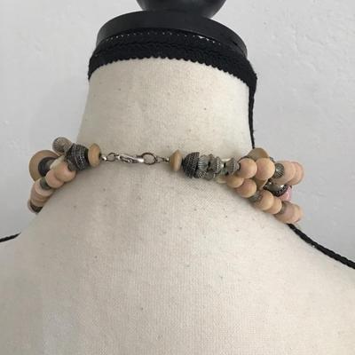 Sale Photo Thumbnail #251: Beautiful, multi strand beaded necklace with pink and cream, silver toned beads. Please see attached photos.