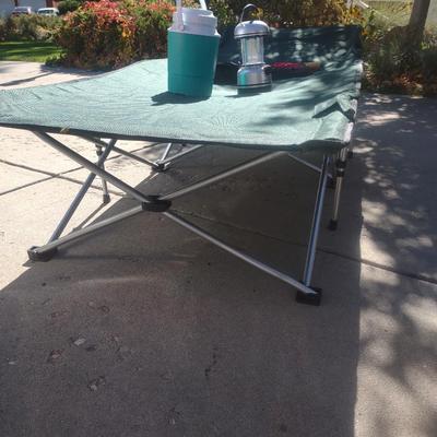 CAMPING COT, BEVERAGE COOLER, LANTERN AND UMBRELLA