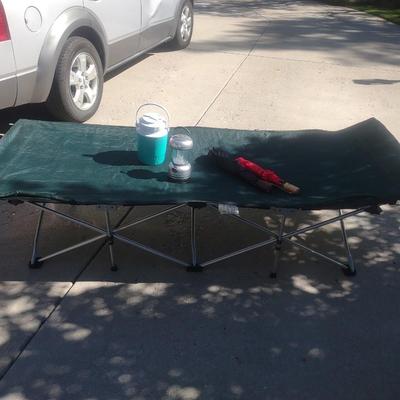 CAMPING COT, BEVERAGE COOLER, LANTERN AND UMBRELLA