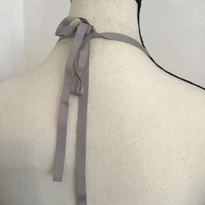 Sale Photo Thumbnail #76: Bib style ribbon, tie necklace with Crystal and milk glass bead clusters. Please see attached photos.