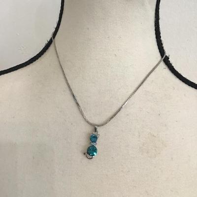 Sale Photo Thumbnail #89: Very nice Silvertone necklace with blue rhinestone cat pendant. Please see attached photos.