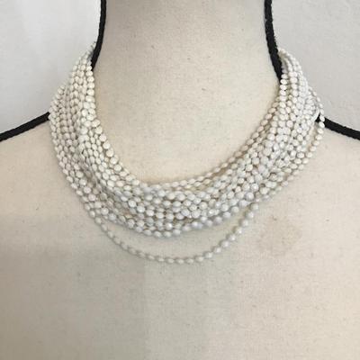 Sale Photo Thumbnail #108: Vintage multi strand, white beaded necklace with floral clasp. Please see attached photos.
