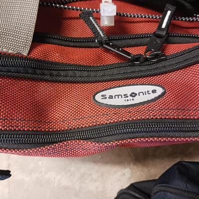 SAMSONITE AND ANOTHER SOFT SIDED BAG PLUS AN UMBRELLA