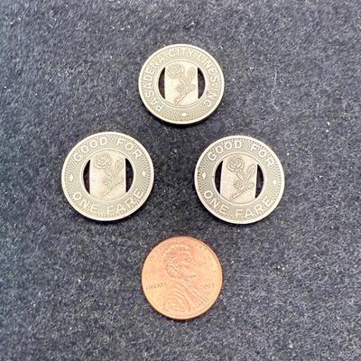 Sale Photo Thumbnail #455: Lot of 3 tokens. Slightly larger than a US penny. Rare, in very good condition. The Pasadena Transit Lines was created in 1941 to switch use of the previous Pacific Electric streetcar lines to busses.  PTL busses became either LA RTD or Pasadena Transit i
