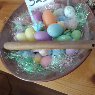 EASTER EGGS IN A LARGE CLAY BOWL