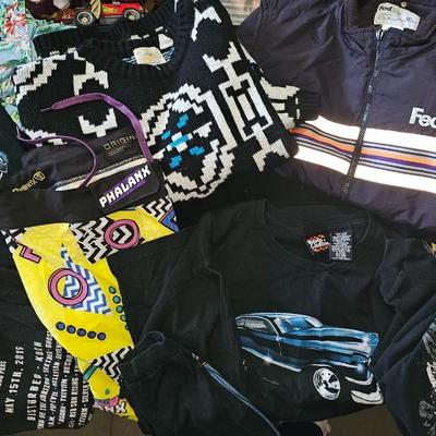 Sale Photo Thumbnail #282: Vintage Clothing Lot | Graphic Tees, Phalanx Shorts, FedEx Designer Vest, and More | Medium and Large Lot
