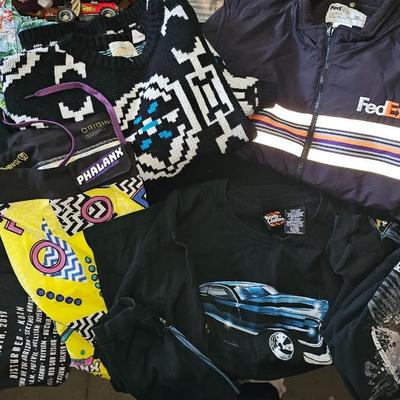 Sale Photo Thumbnail #283: Vintage Clothing Lot | Graphic Tees, Phalanx Shorts, FedEx Designer Vest, and More | Medium and Large Lot