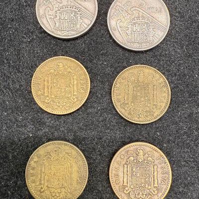 Sale Photo Thumbnail #481: 6 coins: four 1 Paseta coins (authorization dates are: 1953, 2 from 1963, and 1966; minting dates are 1956, 1963, 1965 and 1967) and two 5 Paseta coins (both authorized in 1957, minted in 1960 and 1964). All coins feature the image of Francisco Franco, Sp