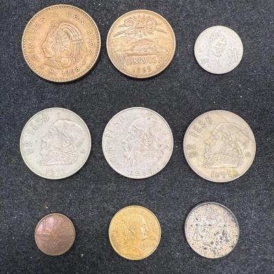Sale Photo Thumbnail #506: Lot includes 9 coins of various denominations and years.  See photos for details.