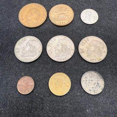 Sale Photo Thumbnail #505: Lot includes 9 coins of various denominations and years.  See photos for details.