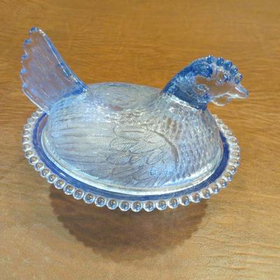 Sale Photo Thumbnail #23: Vintage blue Indiana glass blue hen on nest container with no chips or cracks! Part of the 1970s "Confections" series. Measures 5" H x 7" W