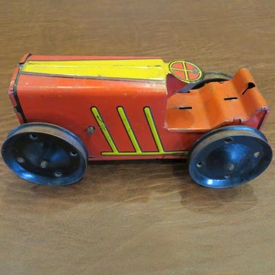 Sale Photo Thumbnail #79: Vintage Marx #2 tin litho wind-up tractor from Louis Marx & Co, c. 1950s