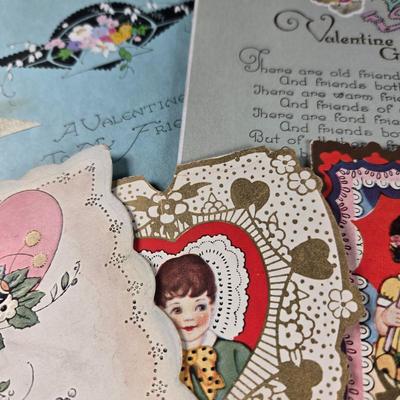 Sale Photo Thumbnail #151: This auction lot is for Victorian Valentines + Hearts.  Thiis a romantic grouping of 7 wonderful Victorian Valentines plus 2 Heart Pendants and a pair of Red Heart pierced Earrings.  The heart pendants are silver-toned and the earrings look to be red enam