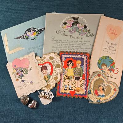 Sale Photo Thumbnail #150: This auction lot is for Victorian Valentines + Hearts.  Thiis a romantic grouping of 7 wonderful Victorian Valentines plus 2 Heart Pendants and a pair of Red Heart pierced Earrings.  The heart pendants are silver-toned and the earrings look to be red enam