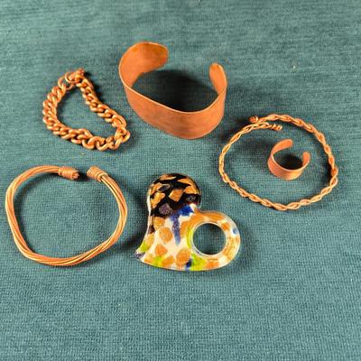 Sale Photo Thumbnail #154: This auction lot is for an All About Copper Jewelry Grouping. This is a fun grouping of handmade 5 solid copper pieces of copper with a Murano Glass Heart pendant with copper accents..  The copper jewelry consists of 4 different bracelets and 1 adjustable